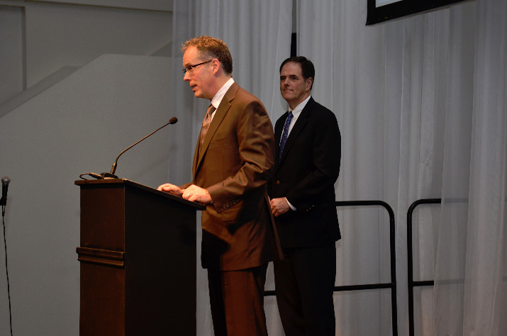 Charlie Swindells at the Podium, Bill R. Swindells on right of image.