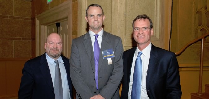 (Heroes for Hope Tom Cook of Taco Bell and Mark Ganz of Cambia with (center) Lines for Life Board Chair Dan McMillan of The Standard.