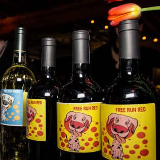 Donated Wine: All the bar wine was donated, relabeled and all bar proceeds benefit Savannah's Fund for rescued Fidos.