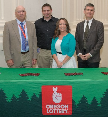 “The Oregon Lottery team was a master sponsor at the Black United Fund of Oregon’s 16th Annual Scholarship Awards Luncheon. They presented a $1500 scholarship later that afternoon to a deserving African American high school student.“