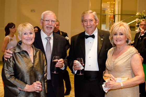 Marsha and Dick Wright pose with Auction Honorary Chairs Bud and Twyla Bailey