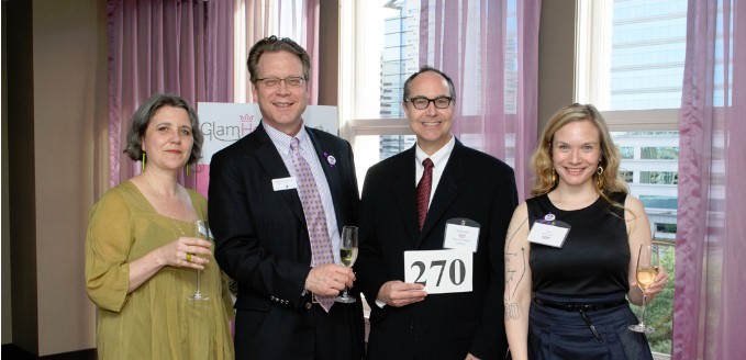 Bradley Angle Executive Director Deborah Steinkopf, Board Chair Harlan Barcus of Capital Pacific Bank, volunteer Jeff Brecht of Sussman & Shank, and Board member Kate Ertmann of Animation Dynamics greet guests as they step off the elevator at The Nines.