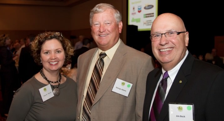 Meals on Wheels People Manager of Corporate Partnerships Marcie Kessel with Compassion for Seniors Award recipients George Adams and Jim Bock, E C Company