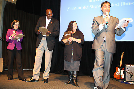 Kate Brown, Oregon Secretary of State; Jerome Kersey, Portland Trail Blazers Alumni Ambassador; and Lisa Watson, owner of Cupcake Jones join MC Keith Thomajan of the United Way of the Columbia-Willamette on stage. Each celebrity competed three challenges throughout the evening – hula hooping, composing a limerick (we’re sorry, we can’t share these – they were bawdy!), and answering trivia questions. Keith successfully wrangled the entire crowd!