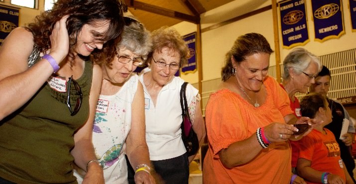 Guests look through the camp archives