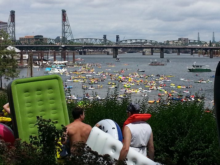 This year, instead of crossing the Willamette River, peopled floated downstream. They launched from Marquam Beach (same as last year) and took out at the Tom McCall Bowl – on the west bank of the river just south of the Hawthorne Bridge.