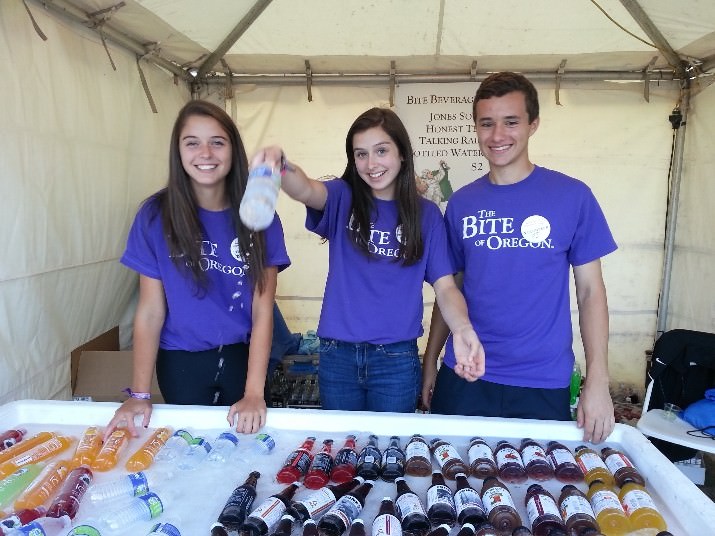 Volunteer who helped out Special Olympics with their donated labor manned stations like the beverage huts. They inculded, Genevieve Klein and Isabel Klein from the National Charity League and PJ Hummelt from Jesuit High School.