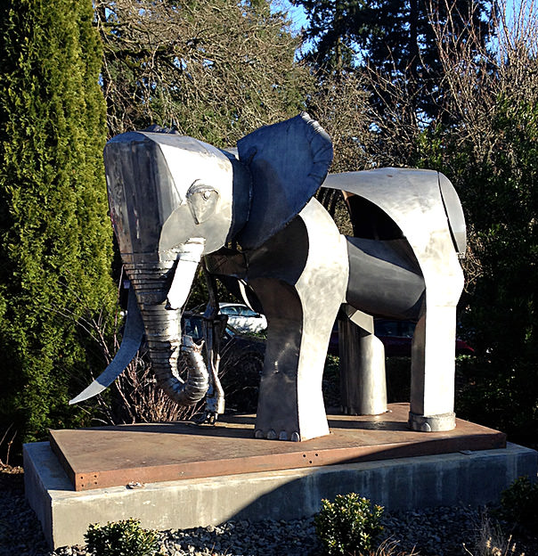 "August Trunk," the 2011 People’s Choice award-winning sculpture by Alisa Formway Roe.was recently relocated there by the Arts Council to enhance and beautify Boones Ferry Road.