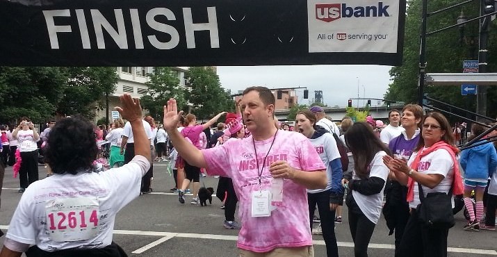 Komen for the Cure's Chief Executive Officer, Thomas Bruner was cheering on walkers at the finish line.
