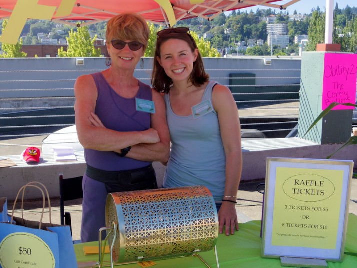 PYB staffer Nancy Pearson (L) and Advocacy Board member Natalie Whitlock (R) preparing for the raffle prize draw.