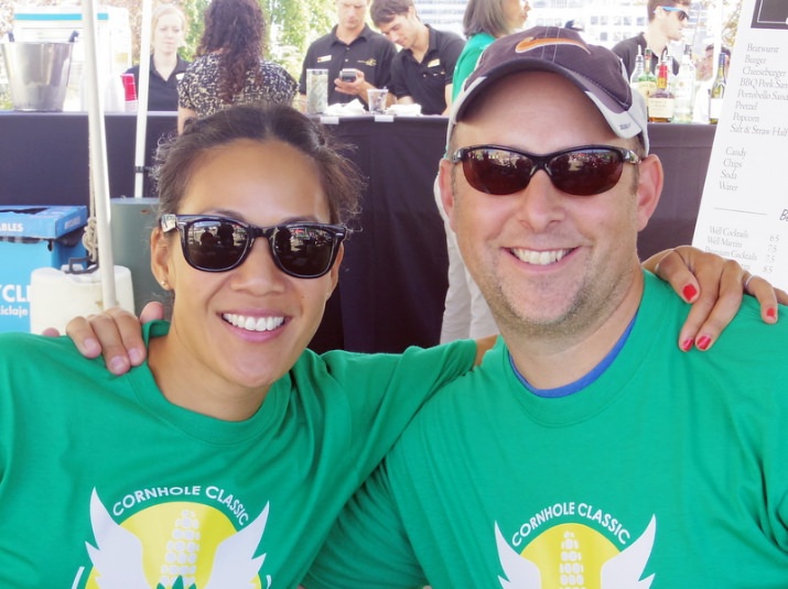 PYB supporters Evelyn Bian (L) and Jeff Robertson (R) sporting their Cornhole Classic t-shirts.