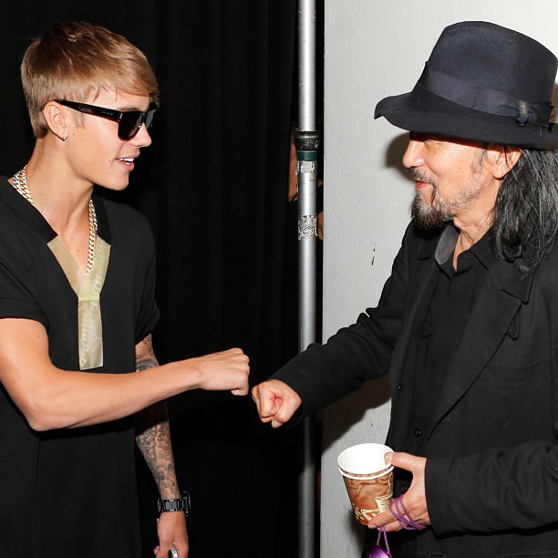 Justin Bieber and Y-3 creative director Yohji Yamamoto meet backstage at the Y3show.