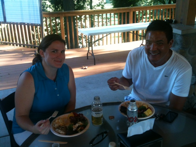 Rachel Wood and Chris Young from Unifylink enjoying chicken, cheesy potatoes and salad after 18 holes of golf.
