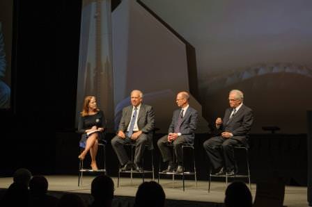 Moderator, afo board member Susan Poss queries Hoffman Corp. President Wayne Drinkward, Gerding Edlen Development CEO Mark Edlen, and Pei Cobb Freed principal Michael Flynn about their collaborations with Benson Industries. They're seated in front of "Benson City" a video skyline comprised of Benson building images from around the globe.