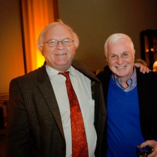 Former Oregon Food Bank board member Phil Kalberer (right) congratulates Mike Lindberg, a Jerry Tippens Advocacy Award Winner. Photo by Sarah Galbraith