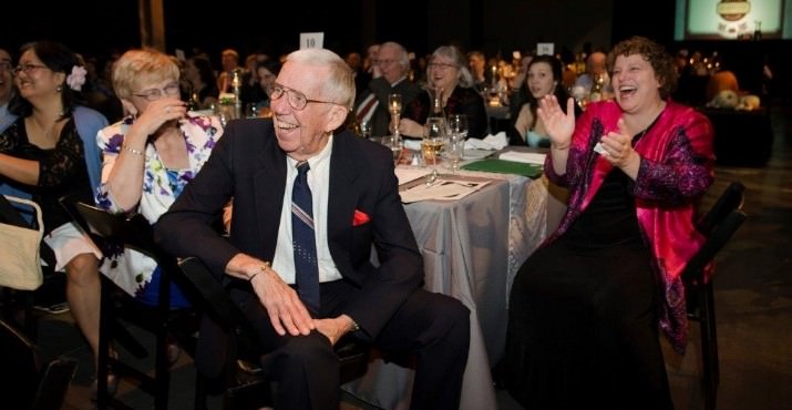 Jackie Fearing Volunteer Award winner Willie Kleen is cheered on by wife Jeanie Kleen and CEO Susannah Morgan. Photo by Sarah Galbraith