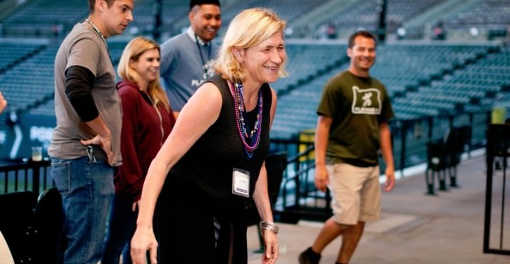 Playworks Founder, Jill Vialet, plays a friendly game of four-square. Cheering her on (left to right): Miles Robinson, Trisha Rhoades, Nicholas Durant, and Eduardo Rosario Jr.