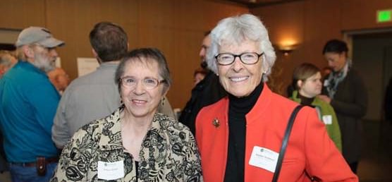 Past staff member Jeanne Rivers with current board member Pauline Anderson.