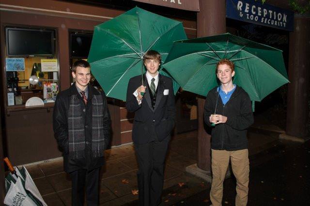 Edison students Donny Engeldinger, Clay Rydick, and Kinley Bassham wake up early to greet guests.