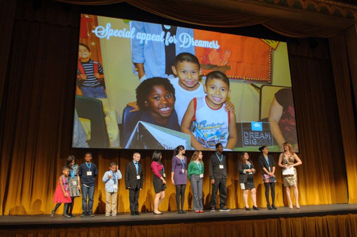 Dreamers in Kindergarten through college take the stage to share their career dreams with event guests and emcee, Kelley Day