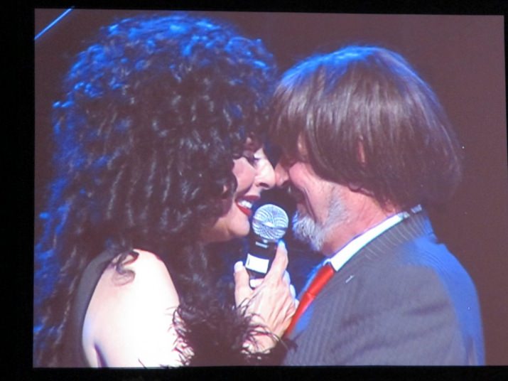 CHER and Beaverton Mayor, Denny Doyle on stage perform a duet of "I've Got You Babe" at Roy Jay's Holiday Extravaganza on Dec. 14 at Oregon Convention Center
