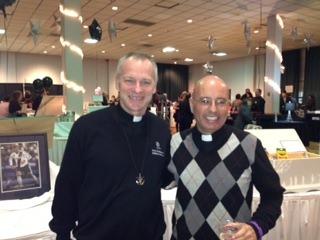 Fr. John Dougherty, Congregation of Holy Cross Priest and Pastor at Holy Redeemer, catches up with old friends.