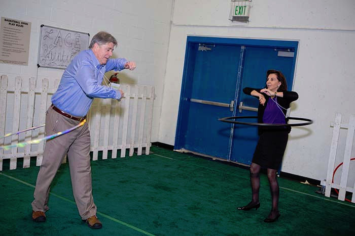 attendees enjoying the “backyard” of the Jewish community through hoola hooping.