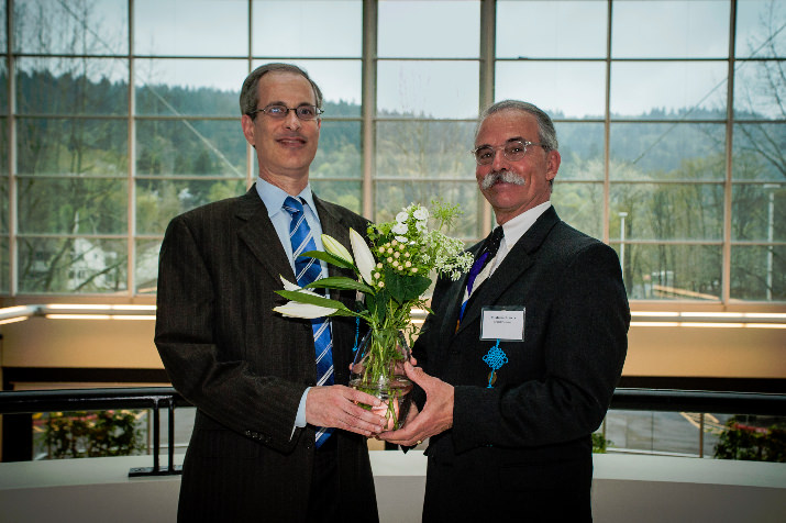 Dr. Charles Elder of Kaiser Permanente with OCOM President Dr. Michael Gaeta 