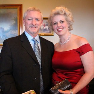 Mark and Jennifer Wood enjoy the silent auction.