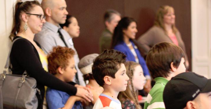 Gresham families and educators watch a presentation by The Right Brain Initiative and local leaders. Photo by Allie Maya.