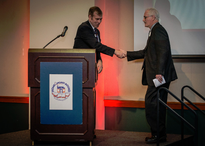 Tigard’s First Citizen (and CPAH Board Vice President) Tom Murphy, (left), presents Metro Councilor Craig Dirksen with the “Friend of Affordable Housing” award at CPAH’s HomeWord Bound.