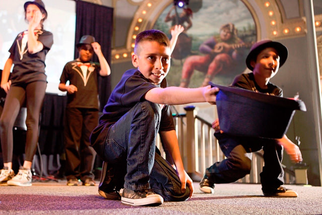 Camp Fire kids sing and dance to Stevie Wonder during their set as “The Fedora-bles.”  