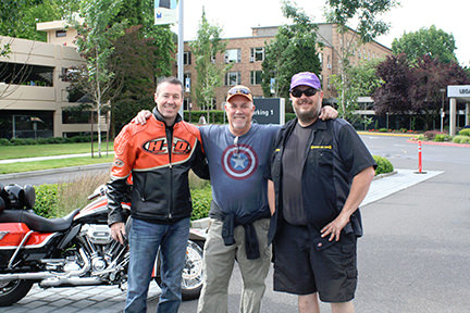 Mike of Paradise Harley-Davidson, Cliff Thorne, JoyRide Committee, and Chris Lee of Rubber Side Down. Paradise Harley-Davidson and Rubber Side Down are sponsors of JoyRide.