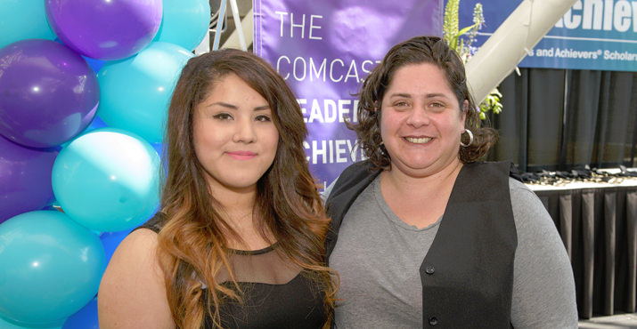 Vanessa Dominguez (left), 2013 Comcast Leaders and Achievers and Founder’s scholarship winner, joins the celebration to share her first-year experience of college with the 2014 winners. While attending Oregon State University, Vanessa continues her work at Momentum Alliance as youth director with co-executive director Rebecca Shine (right).