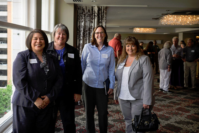 (L) Annette Campista, Vice President and Planning Committee member poses with attendees