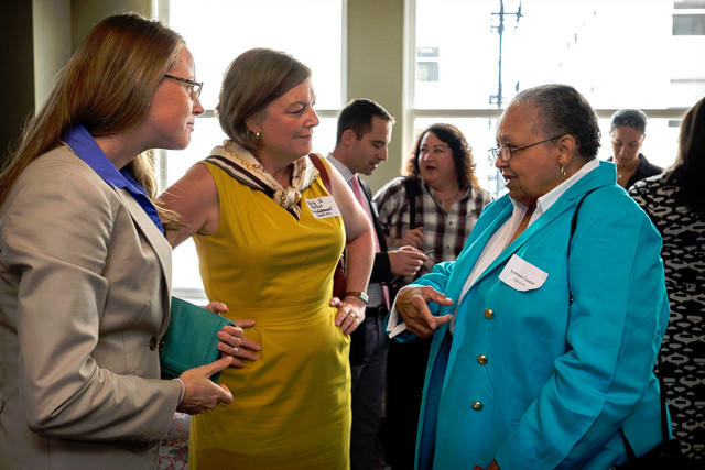 Lifetime Achievement Award recipient, Kathleen Saadat talks with Luncheon attendees