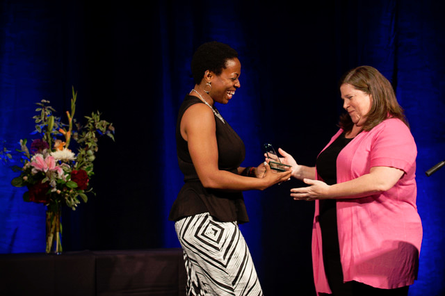 Equity Foundation Executive Director, Karol Collymore present the leadership to Basic Rights Oregon's Executive Director, Jeana Frazzini