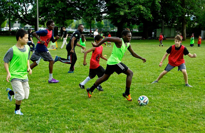 June 19, 2014, Portland, OR, USA,Steve Zakuani and the 4 Worlds United Soccer Alliance play soccer with refugee kids at Powell Park. Photo, Craig Mitchelldyer-Portland Timbers