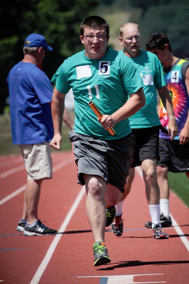 Michael Hart runs in the Newberg games.