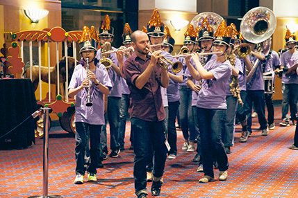 Jordan Roquemore, Beaverton High School Marching Tech, leads members of the Beaverton Marching Ensemble, in a rousing rendition of “When the Saints Go Marching In” to transition revelers to the Portland Ballroom for the evening’s program.