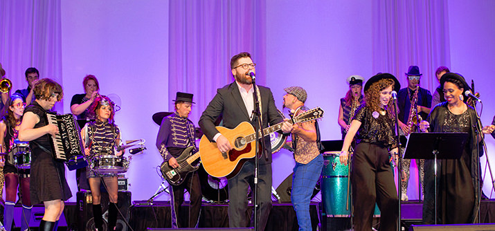 The Decemberists front man, Colin Meloy, serenades Wonderball guests with the help of bandmates, Jenny Conlee and Chris Funk (not pictured), and the March 4th Marching Band.