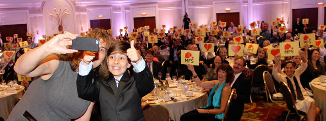 Nine-year-old Master of Ceremonies, Diego Delascio and MFS Development Chair Julie Harrelson commemorated the evening with a photo. Diego proudly declared, “Look out Ellen DeGeneres, I’m the new king of selfies!”