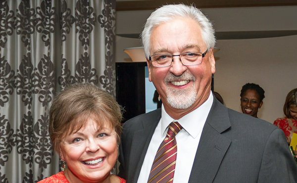 Jim and Barbara Boyer ready to raise their paddles