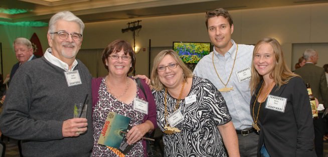 David and Lynn DiCesare, board chair and event emcee Betsy Henning, and Josh and Emily Oliva