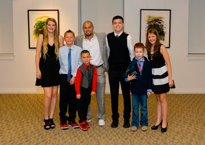 The 2014 Doernbecher Freestyle designers pose with Boston Red Sox outfielder Shane Victorino. Left to Right: Missy Miller, Caden Lampert, Alejandro Munoz, Shane Victorino, Tim Haarmann, Chase Crouch and Addie Peterson.