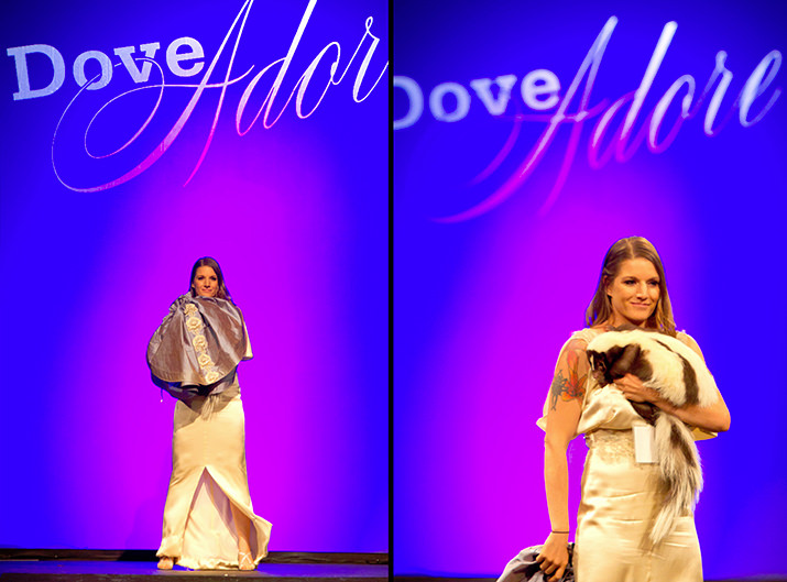 Tresura Newell reveals Penelope the skunk under a custom ensemble, both styled in Michelle DeCourcy designs.