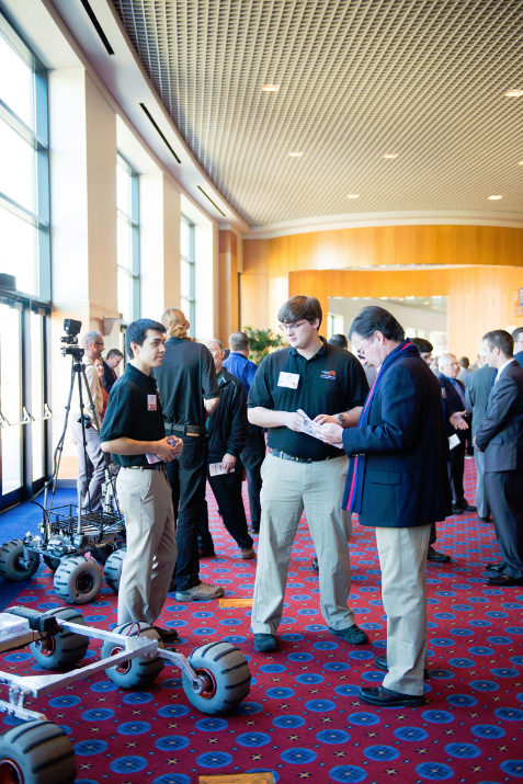 Members of the OSU Robotics Club's Mars Rover Team show off their NASA Challenge entry.