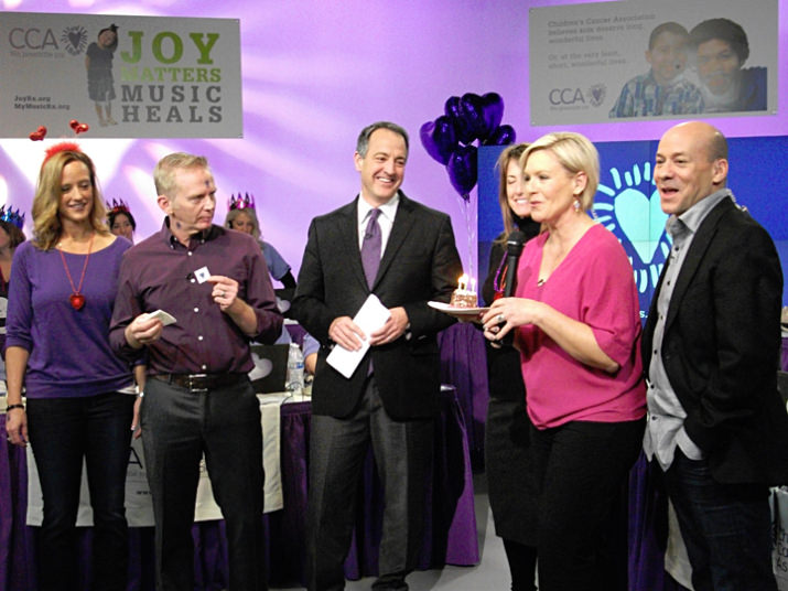 Regina Ellis, CCA Founder and Chief Joy Officer, presents FOX 12 Oregon’s Pete Ferryman with a tiny birthday cake with five lit candles, each representing a $1,000 donation. Also pictured are: Allison Clarke, President Allison Clarke Consulting and CCA Ambassador Board Co-chair, FOX 12 Oregon’s Andy Carson, Kimberly Maus, and Tony Gonzalez.