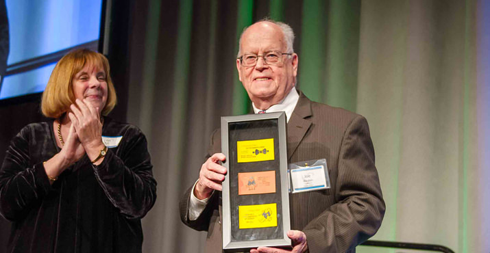 Pat Budo, Administrator, Providence Child Center, presenting Joe Weston with a special gift at the Heart of Gold Award dinner.