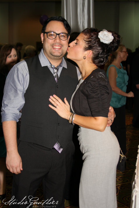 OnPoint Credit Union was a golden sponsor of SnowCap’s 13th Annual Dinner and Auction. OnPointe staff Rene Wolfe was so excited by the handmade quilts, that she just wanted to kiss someone. Luckily, her husband, Craig Wolfe walked straight into it.